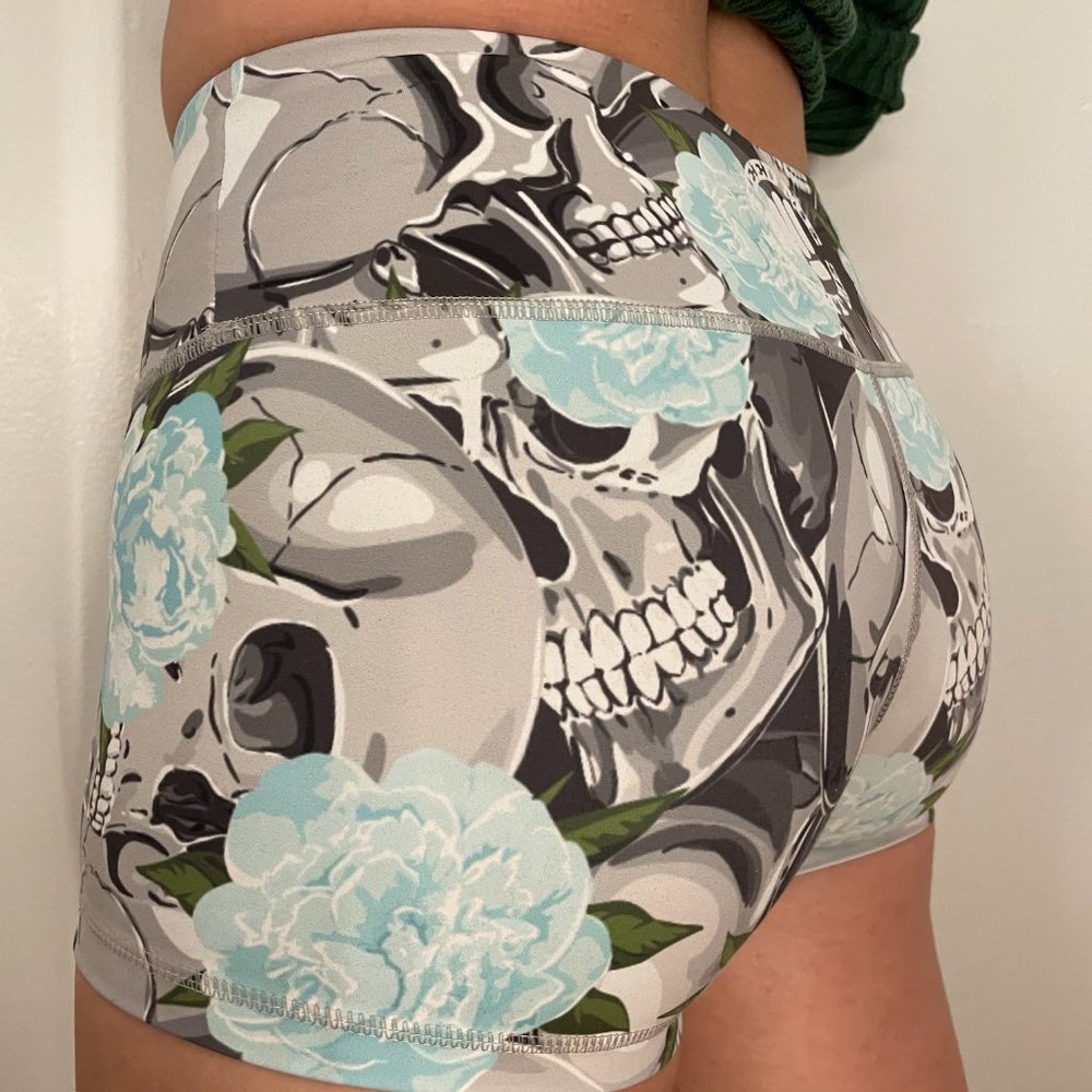 Feed me fight me booty shorts, skull flowers size M